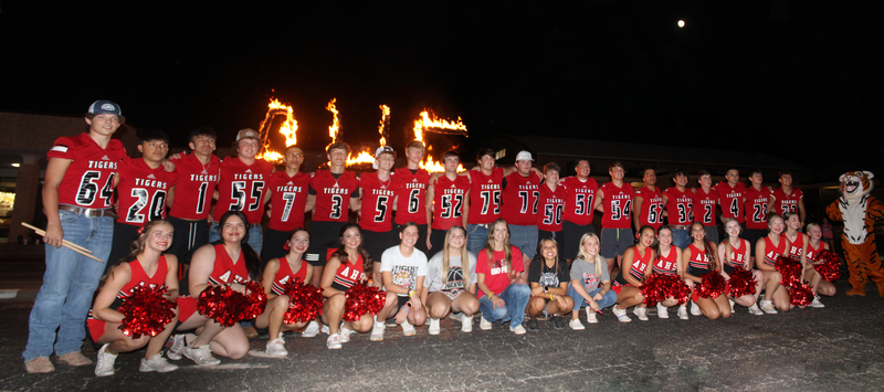 Team/cheer at burning the letters